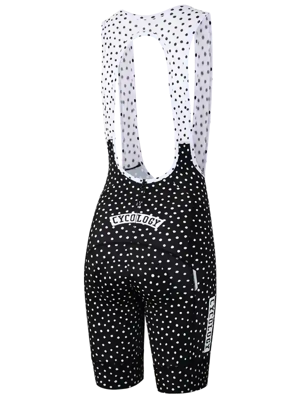 Black and white polka dot women's cycling bib shorts with Cycology branding, designed for comfort and performance.