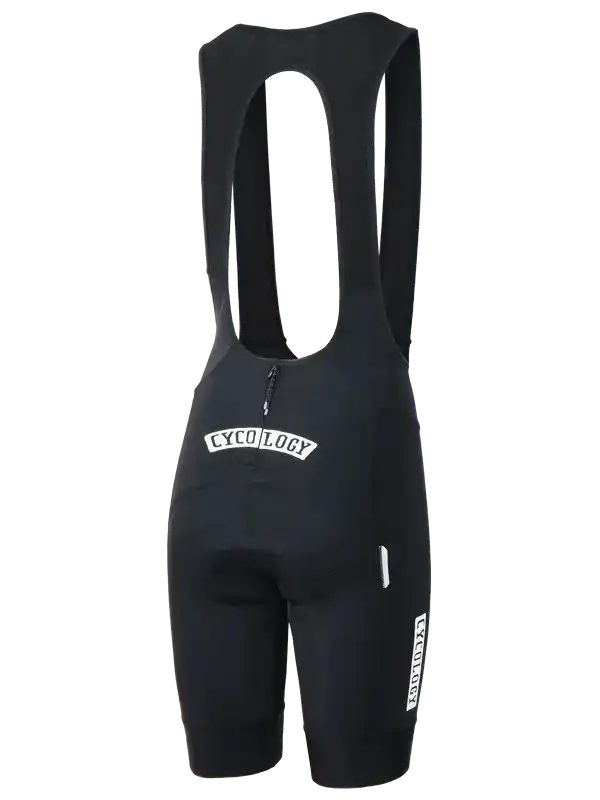 Black men's cycling bib shorts with white CYCOLOGY logo, designed for comfort and performance on rides.