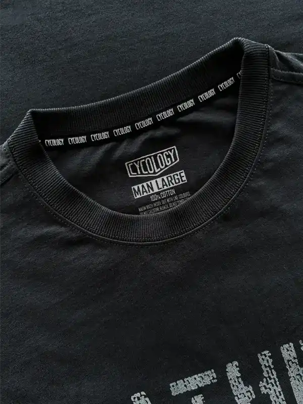 Black men's cycling t-shirt with 'Cycology' tag, 100% cotton, size large, featuring brand logo on collar