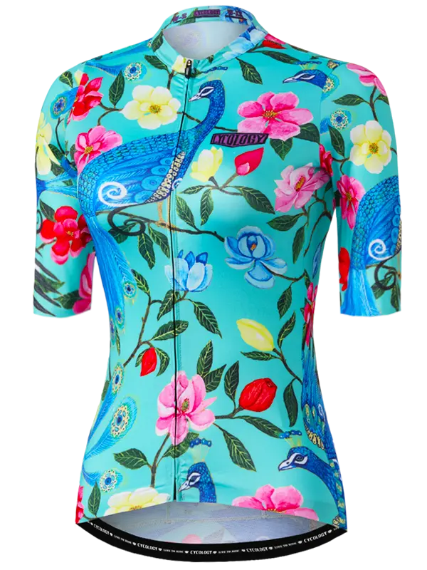 Goddess Blue Women's Reborn Cycling jersey with peacock and floral design on a turquoise background