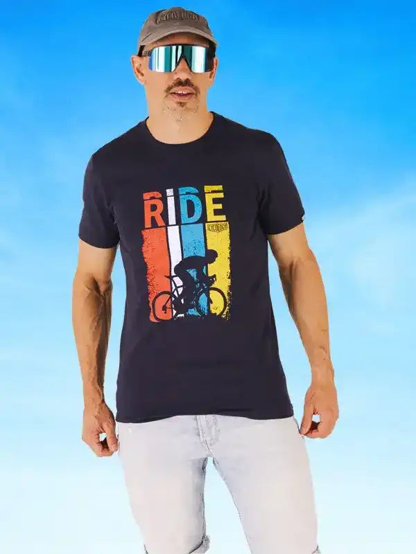 Man wearing black cycling t-shirt with 'RIDE' graphic and cyclist print, ideal for bike rides and outdoor adventures.