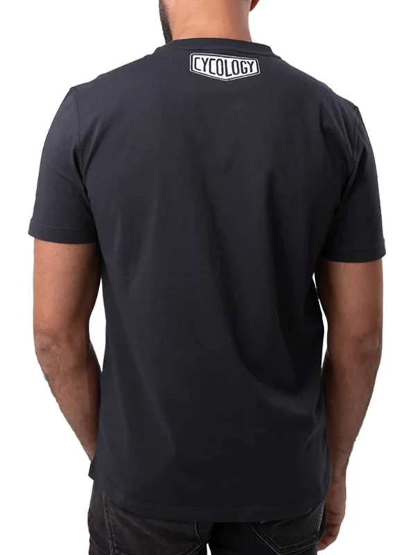 Black men's cycling t-shirt with white Cycology logo on back, casual fit for active wear