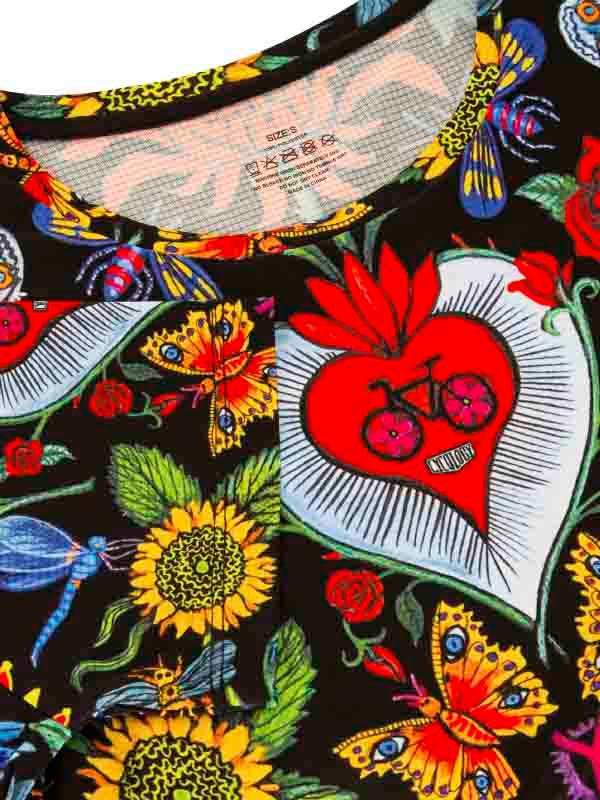 Vibrant floral and butterfly print cycling jersey with heart and bike design, size S