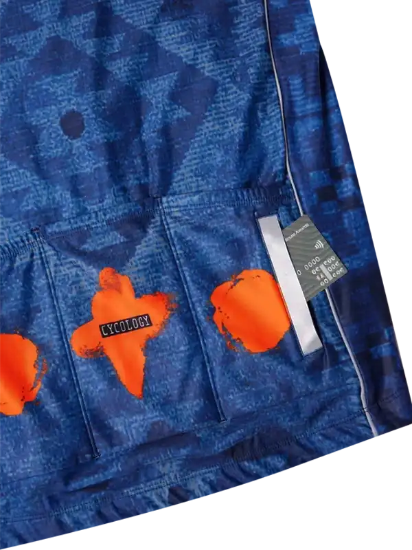 Blue cycling jersey with orange graphic design and rear pockets, featuring 'CYCOLOGY' branding