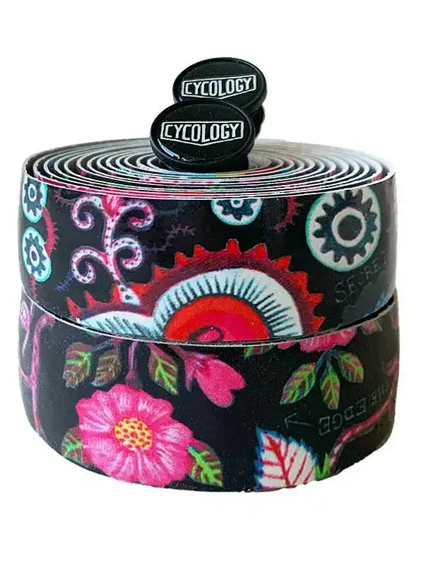 Cycology branded bike handlebar tape with floral and gear pattern, vibrant pink flowers on black background