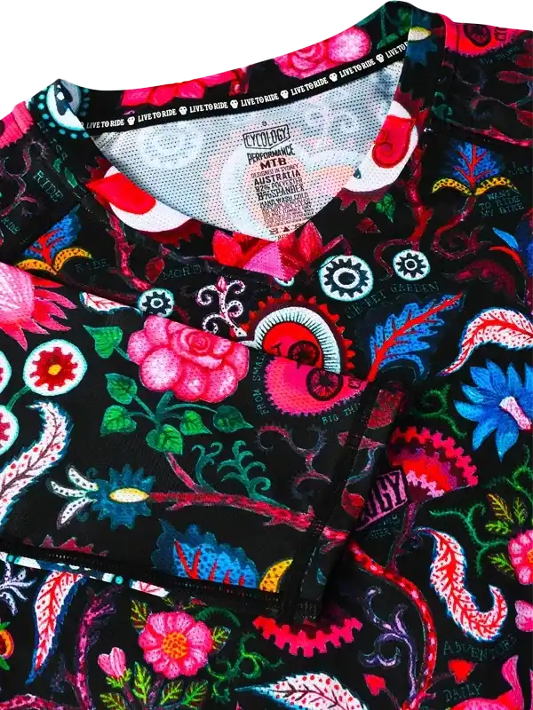 Vibrant floral and gear print cycling jersey with 'Live to Ride' collar detail, performance MTB fabric