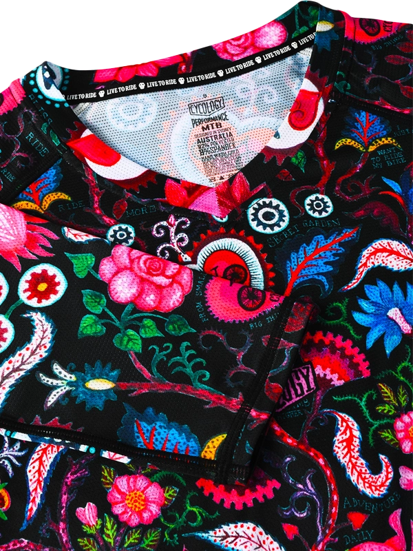 Colorful fabric with floral and abstract patterns on a black background