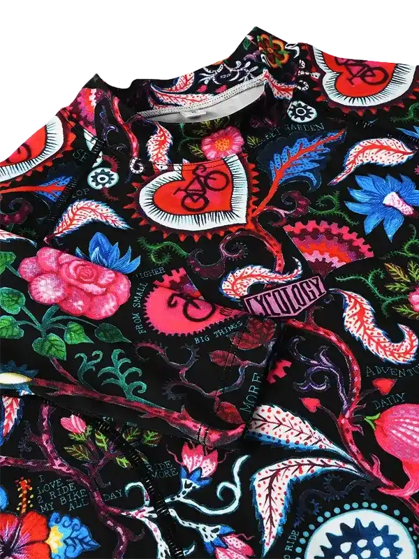 Vibrant floral and bike print cycling jersey with bold colors and unique design for men and women