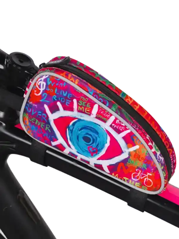 Colorful cycling frame bag with eye graphic and graffiti-style text, mounted on bike top tube