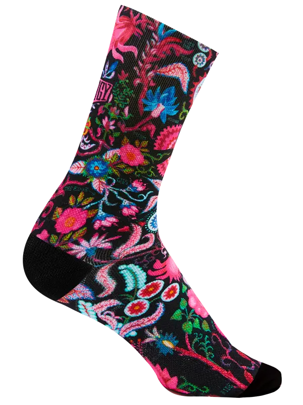Colorful sock with floral design and brand logo on a black background