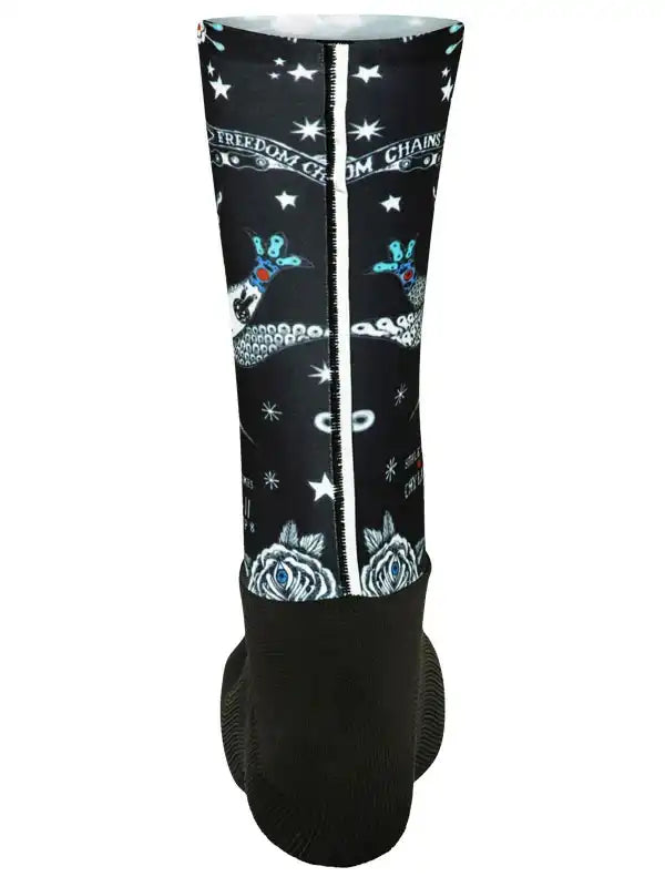 Black cycling leg warmer with star, rose, and chain print design for men and women