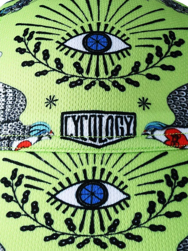 Vibrant green cycling cap with bold eye and bird graphics, ideal for bike riders seeking unique style.