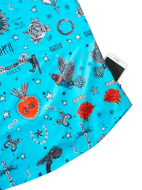 Vibrant blue cycling jersey with tattoo-style roses, birds, stars, and bike graphics, featuring phone pocket.