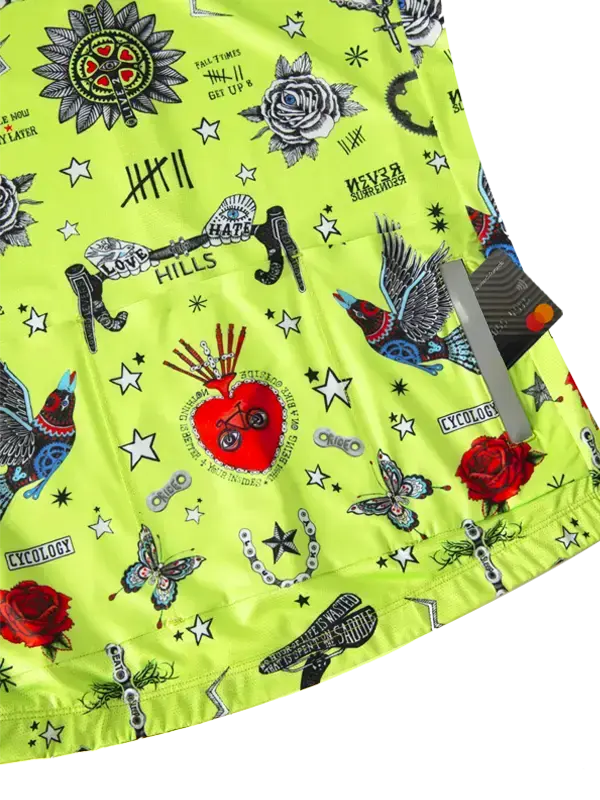 Bright green fabric with tattoo-style designs