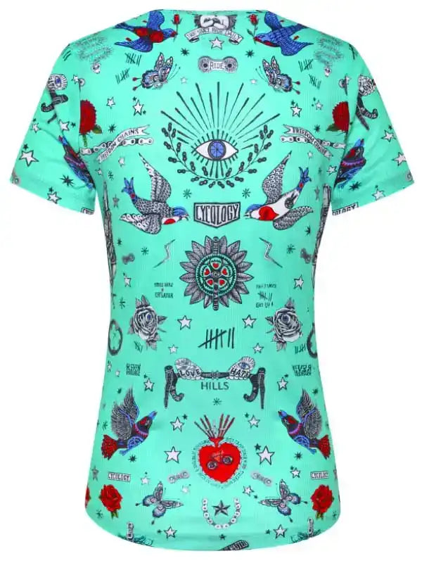 Mint green women's cycling jersey with tattoo-style birds, roses, stars, and eye design
