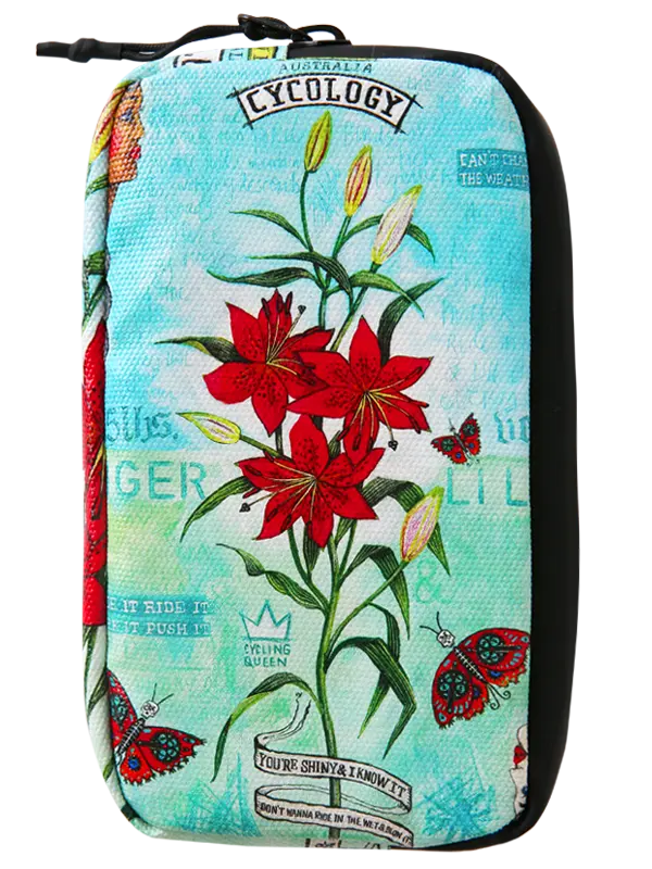 A zippered cycling wallet featuring a vintage-style botanical print with red lilies, green stems, butterflies, and a light blue background with distressed text elements.