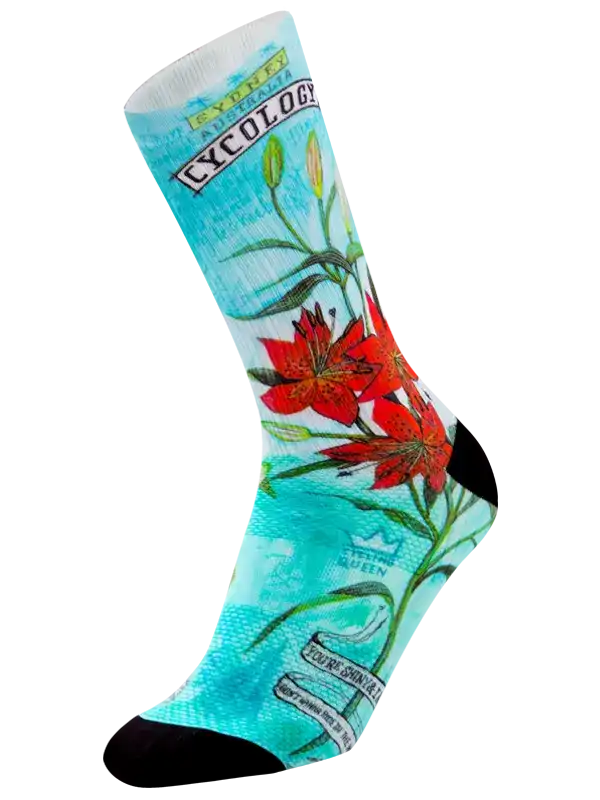 Cycling sock with red lily print, turquoise background, and 'Cycology' branding for bike riders