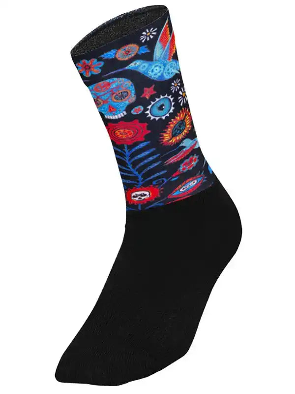 Colorful sugar skull cycling sock with floral and bird designs on black background