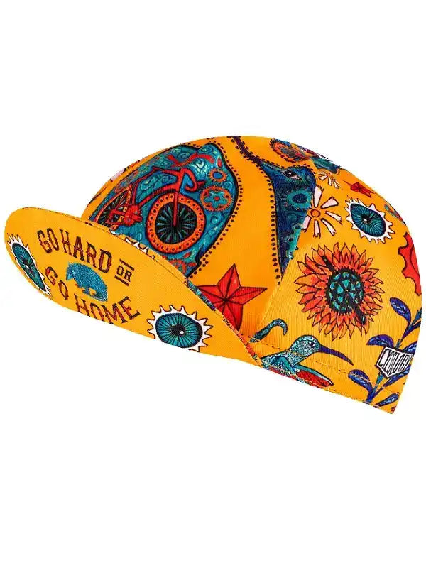 Vibrant yellow cycling cap with floral, bike, and star patterns, featuring 'Go Hard or Go Home' on brim