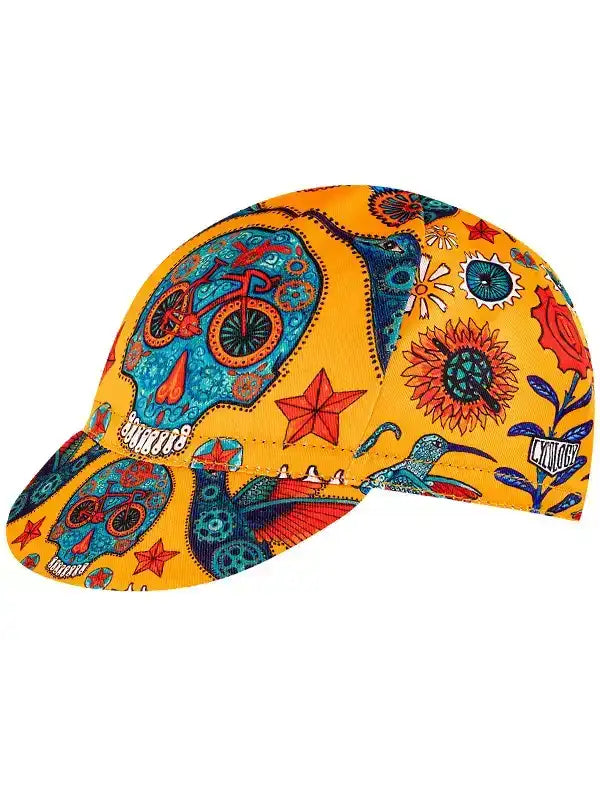 Vibrant yellow cycling cap with sugar skull, bike, and floral designs for men's and women's bike wear