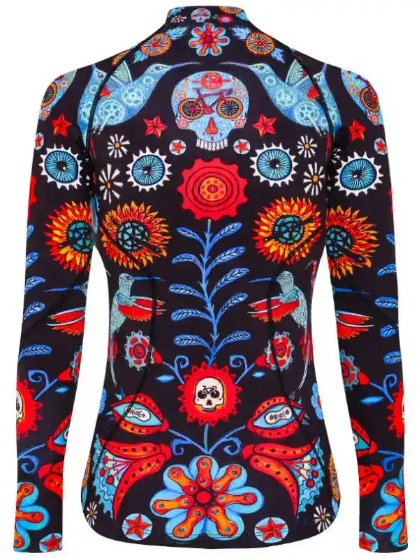 Vibrant Day of the Dead cycling jersey with skulls, flowers, and hummingbirds on black fabric