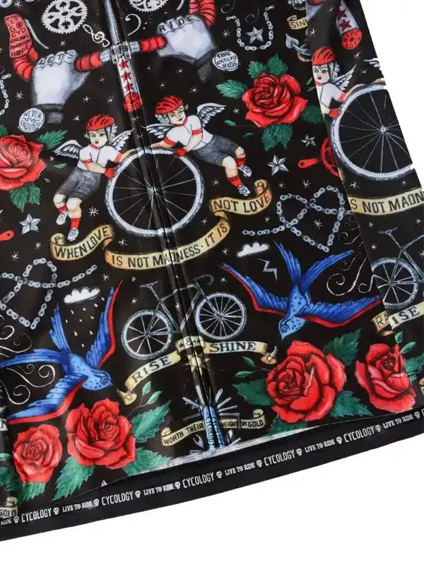 Black cycling jersey with red roses, angels, bikes, and motivational quotes on dark background