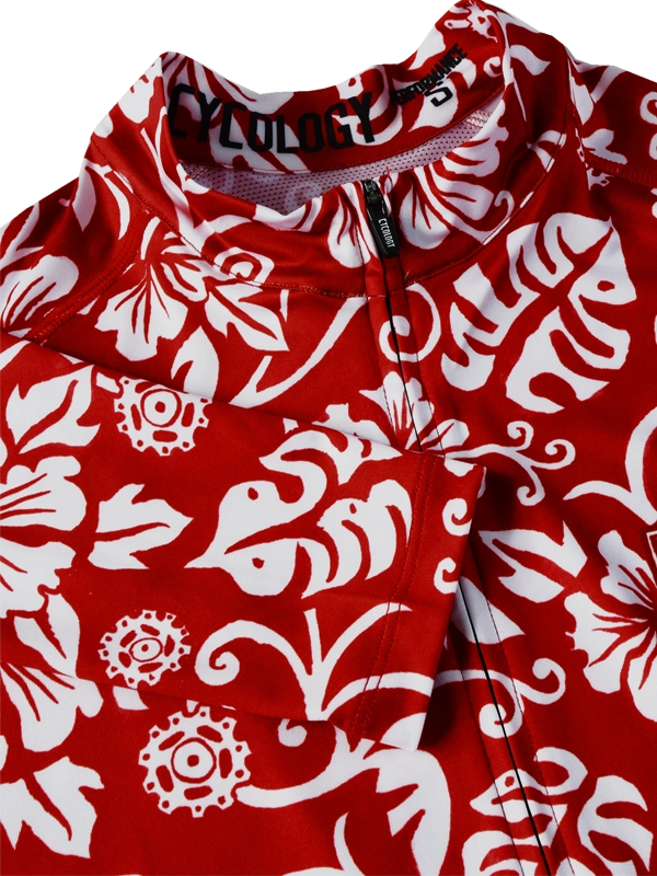 Red and white men's floral patterned long-sleeve cycling jersey with CYCOLOGY branding 