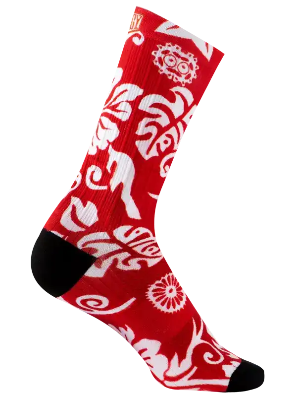Red cycling sock with white tropical leaf and gear pattern, black toe and heel