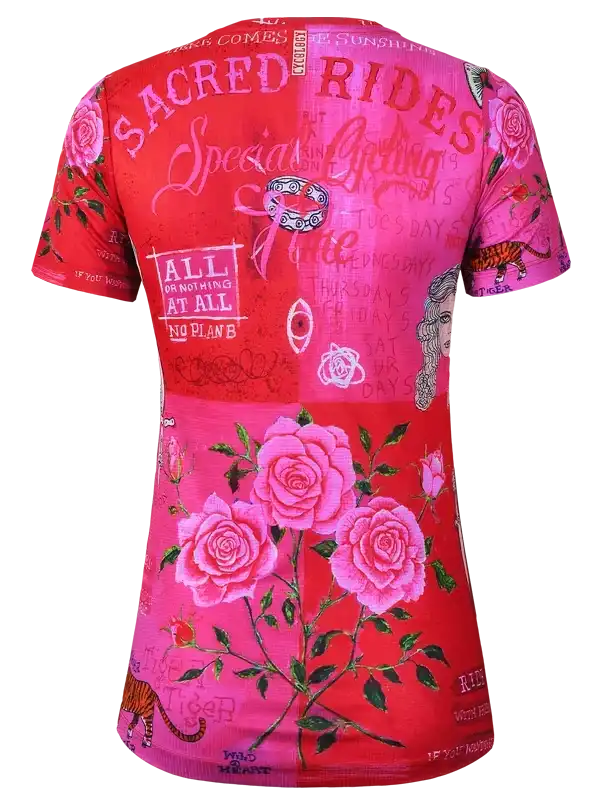 Vibrant pink and red cycling jersey with rose print, 'Sacred Rides' text, and tiger graphics for women's bike wear.