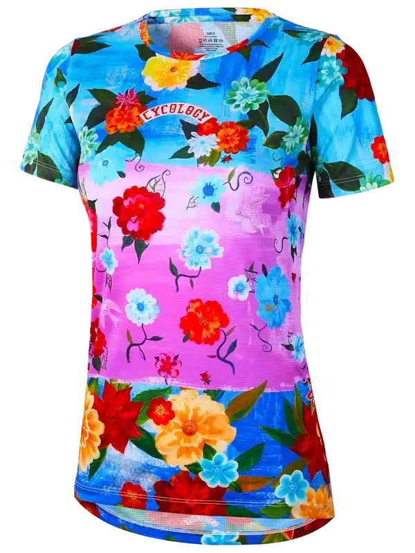Women's floral cycling jersey with vibrant blue and pink print, short sleeves, and performance fabric