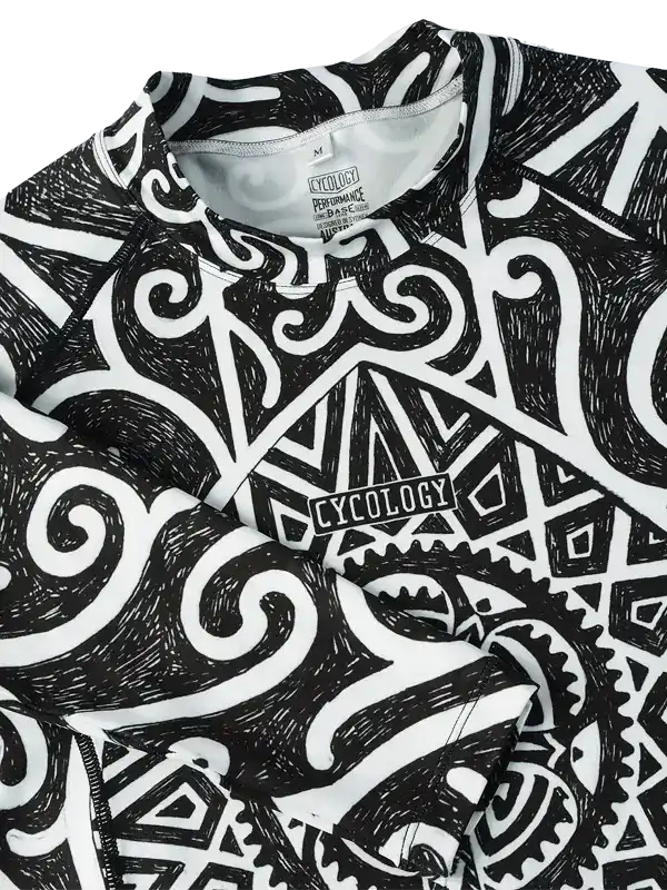 Black and white patterned cycling jersey with bold graphic design and Cycology logo, ideal for men's and women's rides.