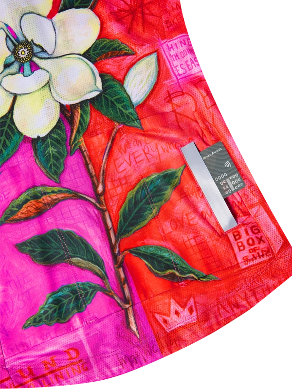 Colorful fabric with floral design and visible brand label 