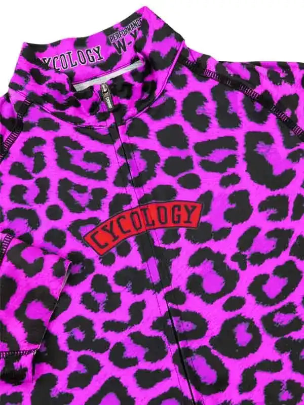 Vibrant pink leopard print women's cycling jersey with bold Cycology logo, performance fabric, full zip