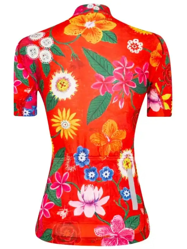 Women's red floral cycling jersey with vibrant tropical flowers and short sleeves, perfect for summer rides.