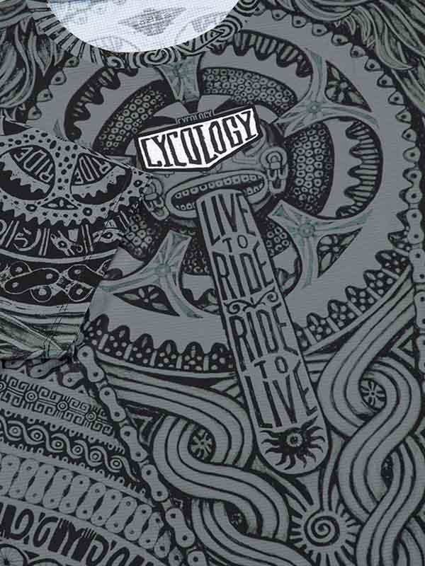 Cycling jersey with intricate black and white doodle art, featuring 'Live to Ride' slogan and gear motifs.