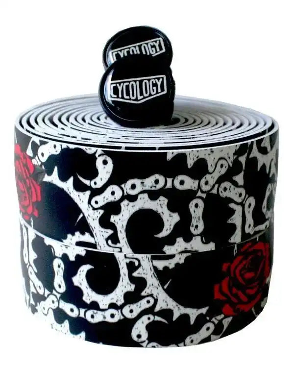 Black and white bike handlebar tape with red roses and chain gear pattern, branded Cycology