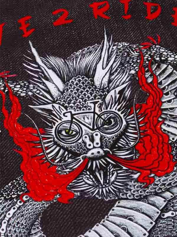 Dragon-themed cycling apparel with bold red flames and intricate bike design