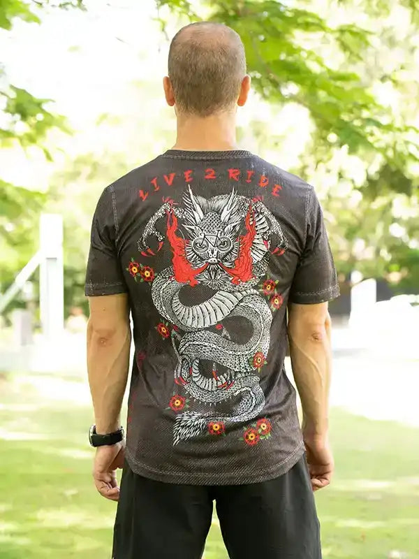 Men's cycling jersey with dragon graphic and 'LIVE 2 RIDE' text, worn outdoors