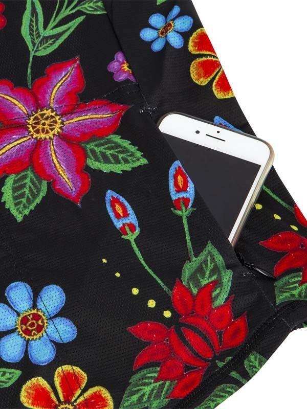 Floral cycling shorts with phone pocket, vibrant flowers on black fabric, ideal for women's bike rides
