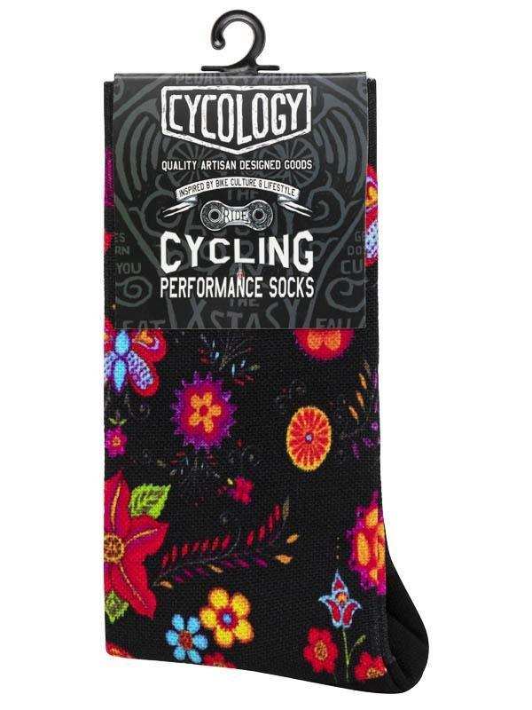 Cycling performance socks with vibrant floral print on black, designed for bike culture and lifestyle.