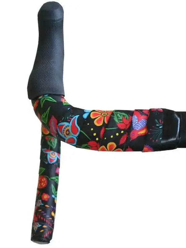 Colorful floral bike handlebar tape with black grip, ideal for cycling comfort and style