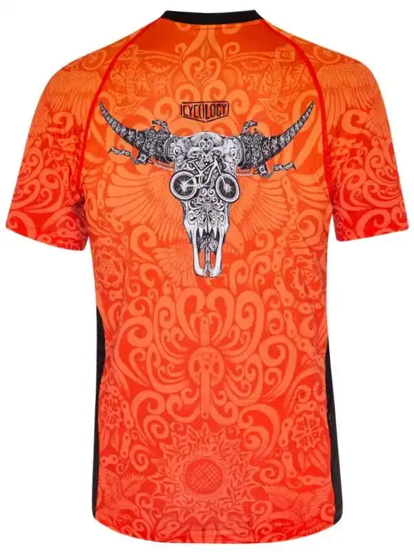 Vibrant orange cycling jersey with bull skull graphic, intricate patterns, and 'CYCOLOGY' logo on back