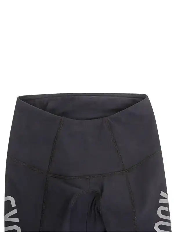 Black women's cycling shorts with high waist and side branding, designed for comfort and performance.