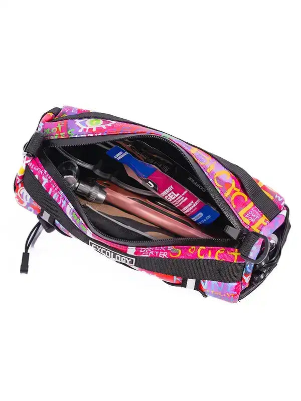 Colorful cycling waist bag with energy gel and tools inside, perfect for bike rides