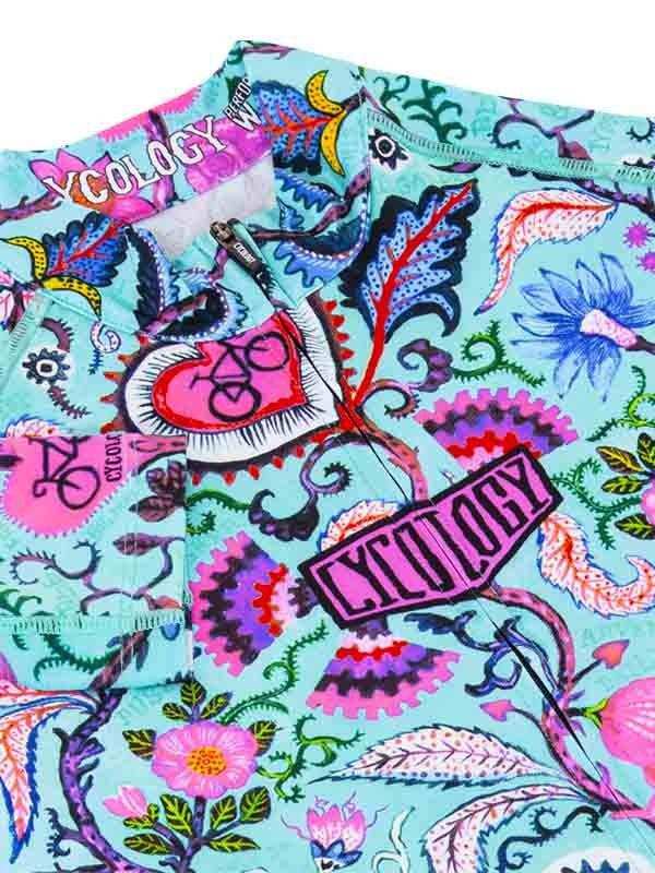 Vibrant floral and bike patterned cycling jersey with colorful graphics and zipper detail