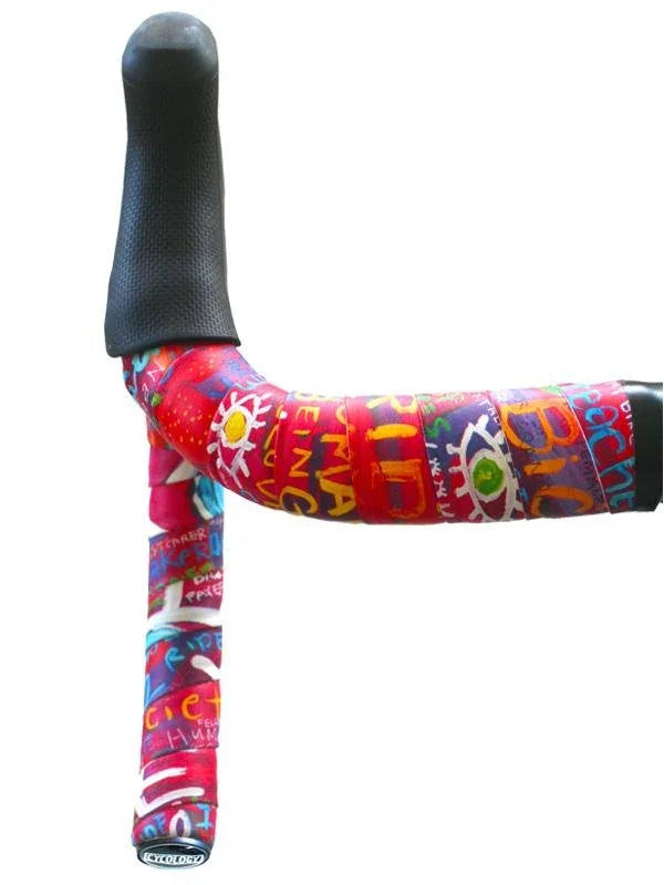 Colorful graffiti-style cycling handlebar tape with black grip, featuring bold patterns and text for road bikes.