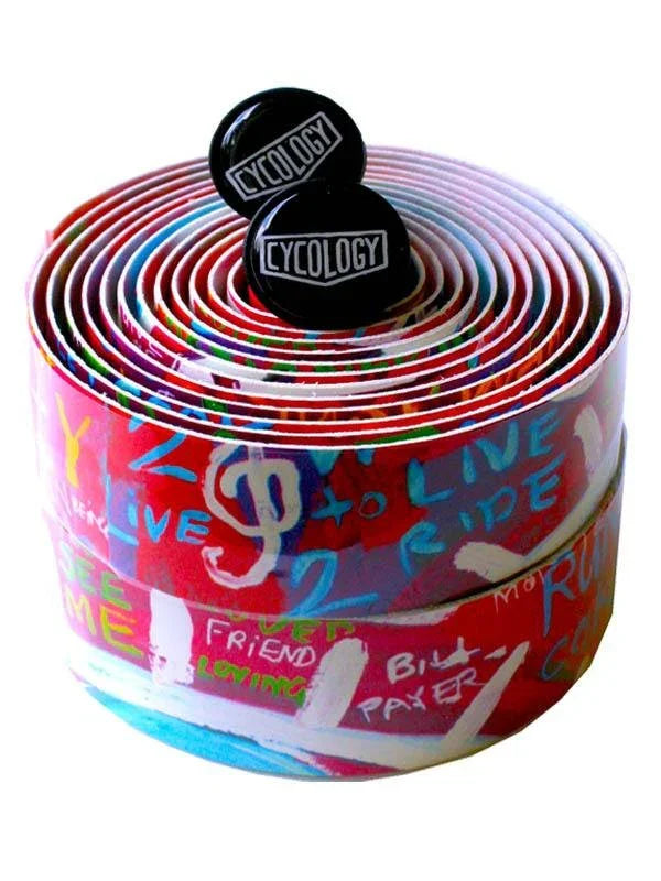 Colorful cycling handlebar tape with graffiti-style design and black Cycology end plugs