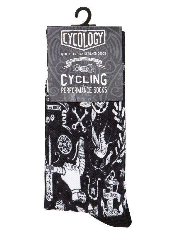 Black cycling performance socks with white tattoo-style bike graphics, ideal for men's and women's cycling apparel